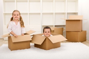 2-kids-playing-in-boxes-300x200